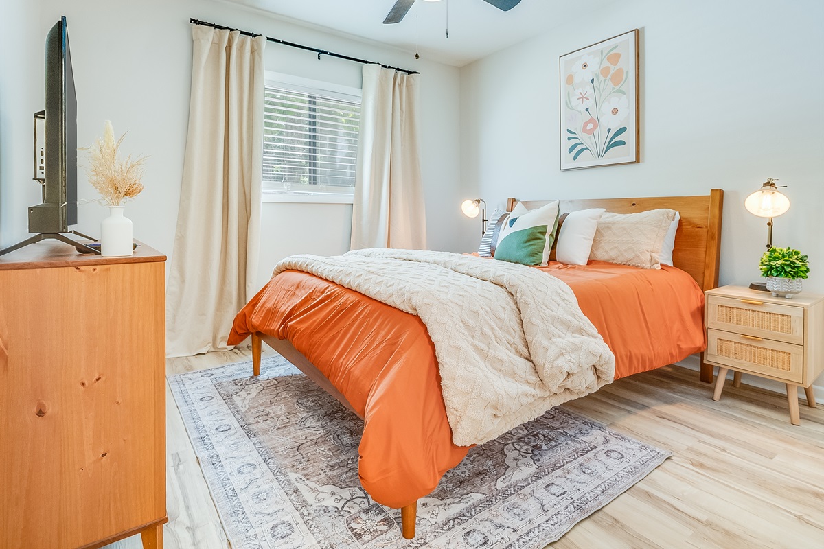 A smart TV in the second bedroom makes it easy to relax your way.