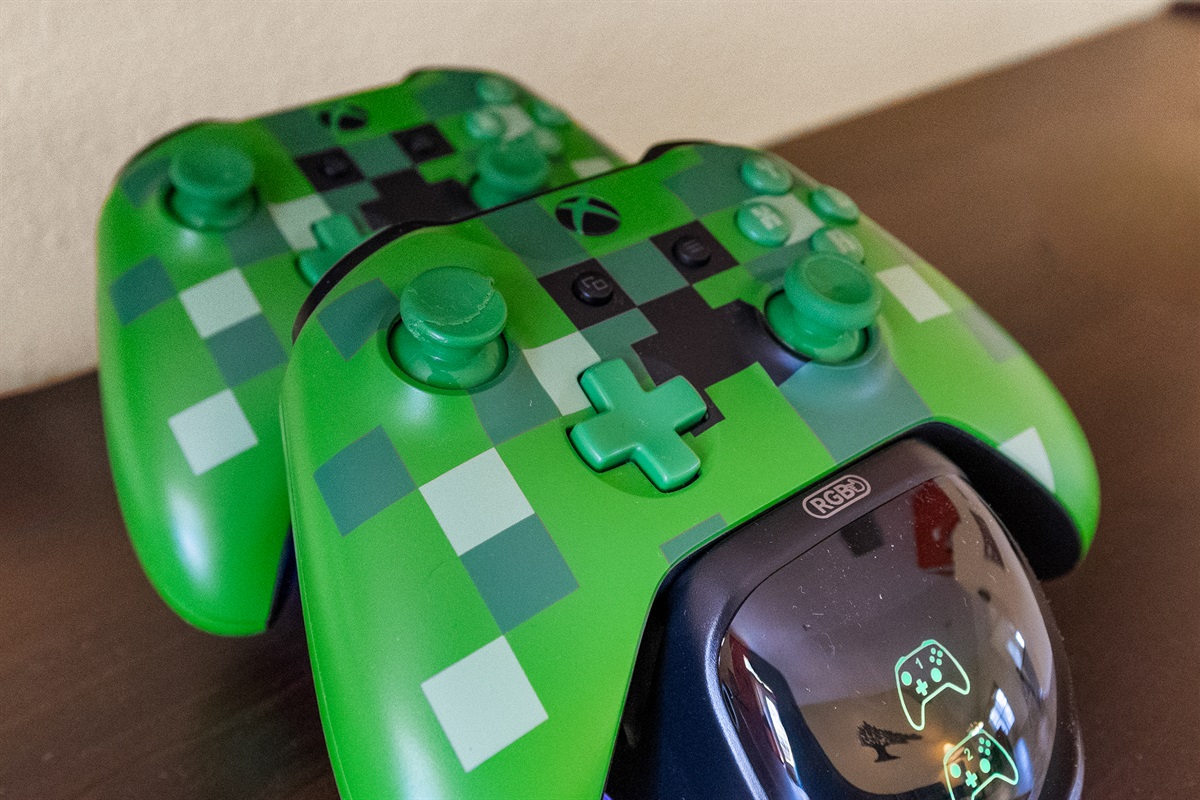 Xbox One with wireless, rechargeable Minecraft controllers and movie and game library.