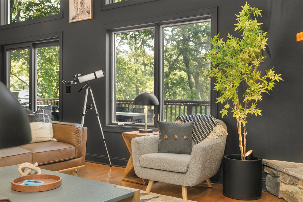 A cozy corner for coffee, conversation, or simply taking in the fire and the forest beyond