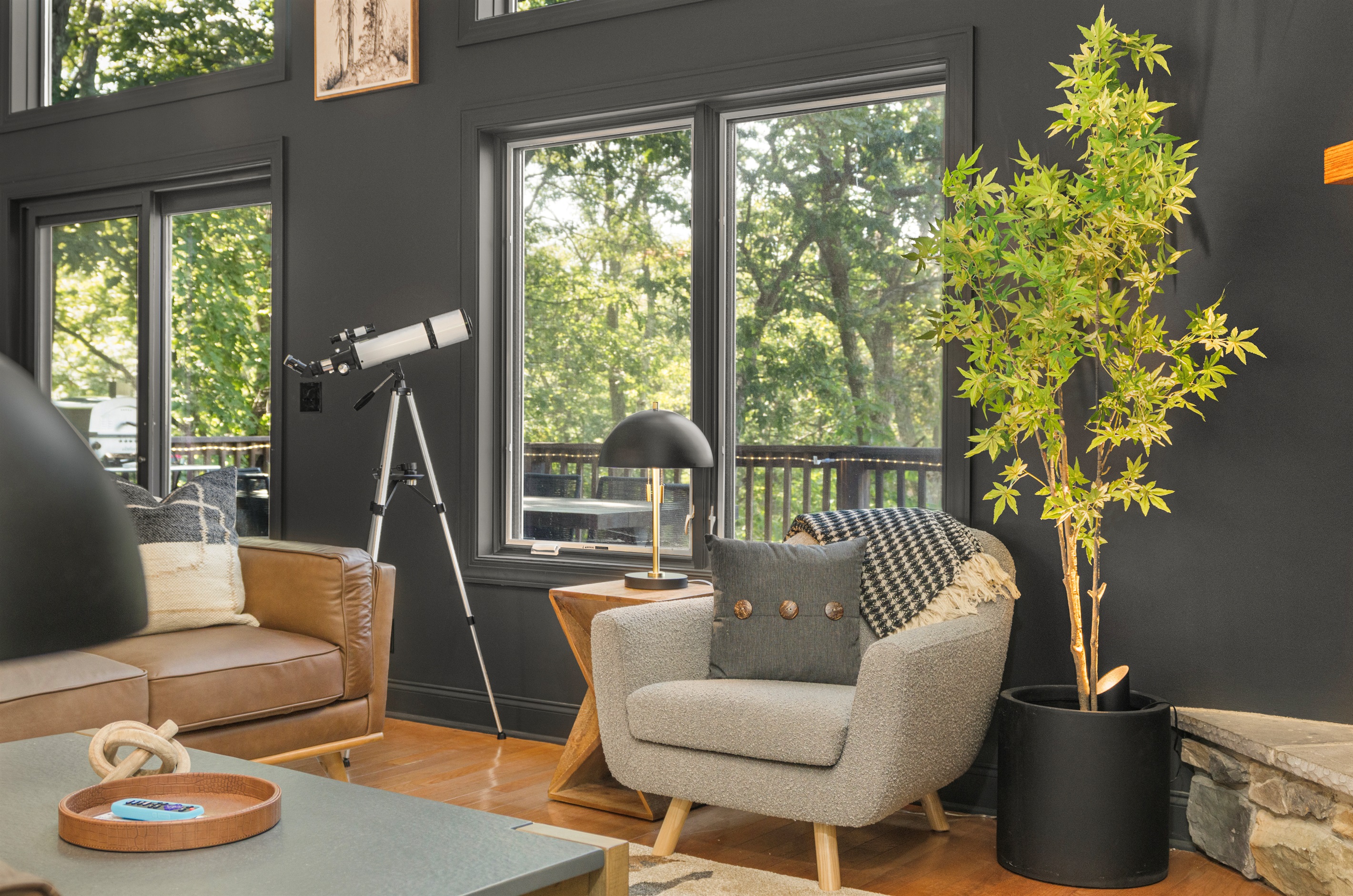 A cozy corner for coffee, conversation, or simply taking in the fire and the forest beyond