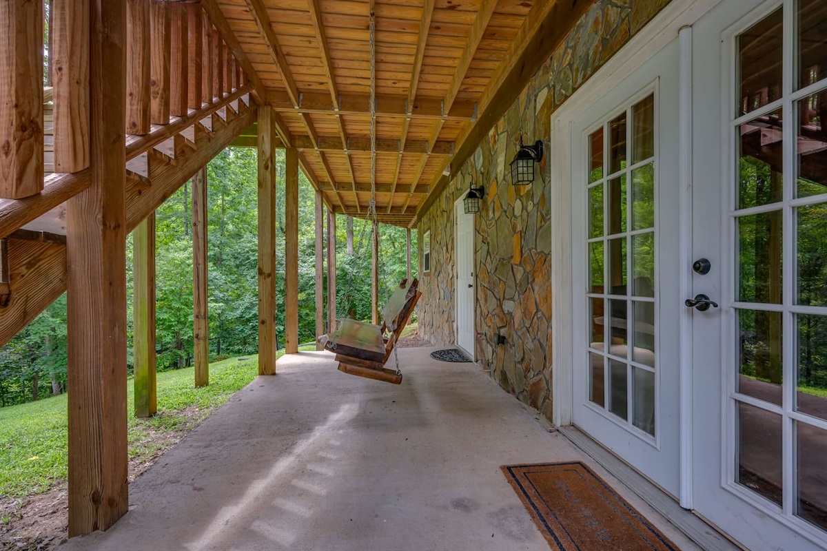 Lower deck with French Doors to 3rd master suite.
