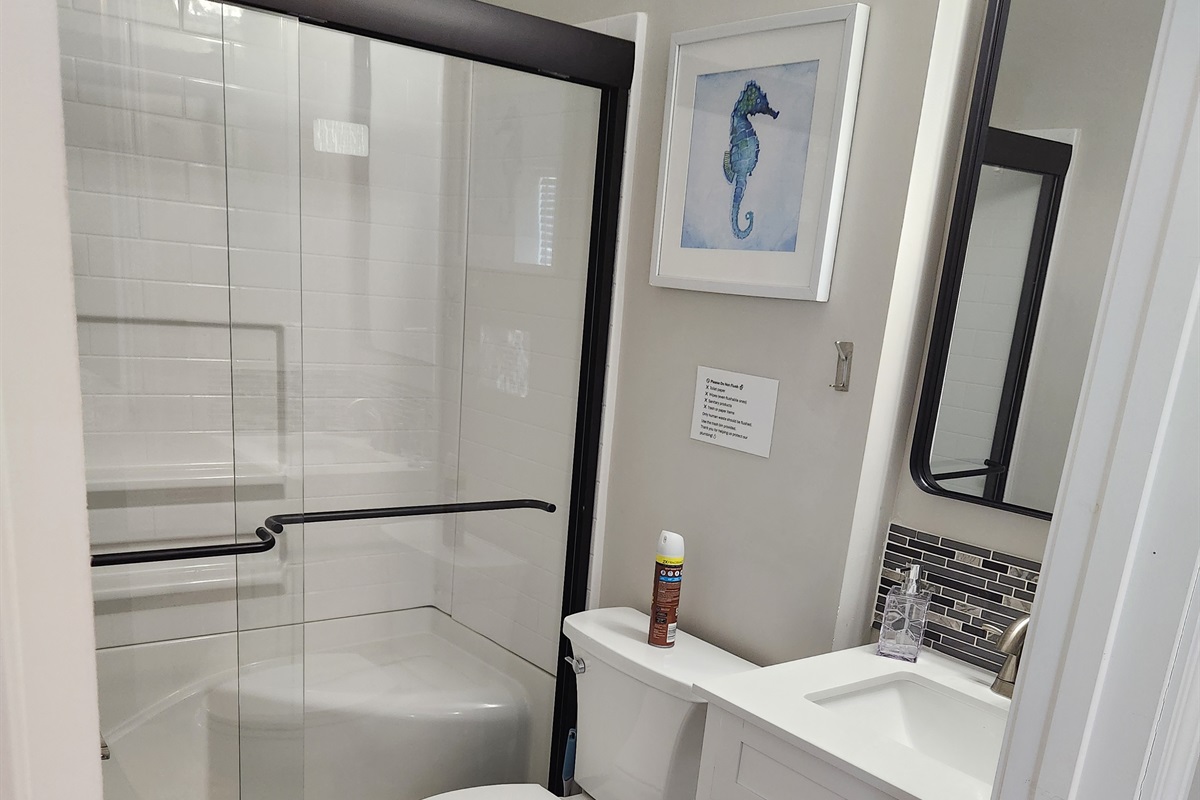 Clean, modern, and thoughtfully designed, this bathroom offers a refreshing space to start and end your day.