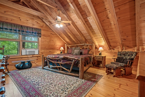 Loft bedroom with King Sized Bed and private full bathroom.