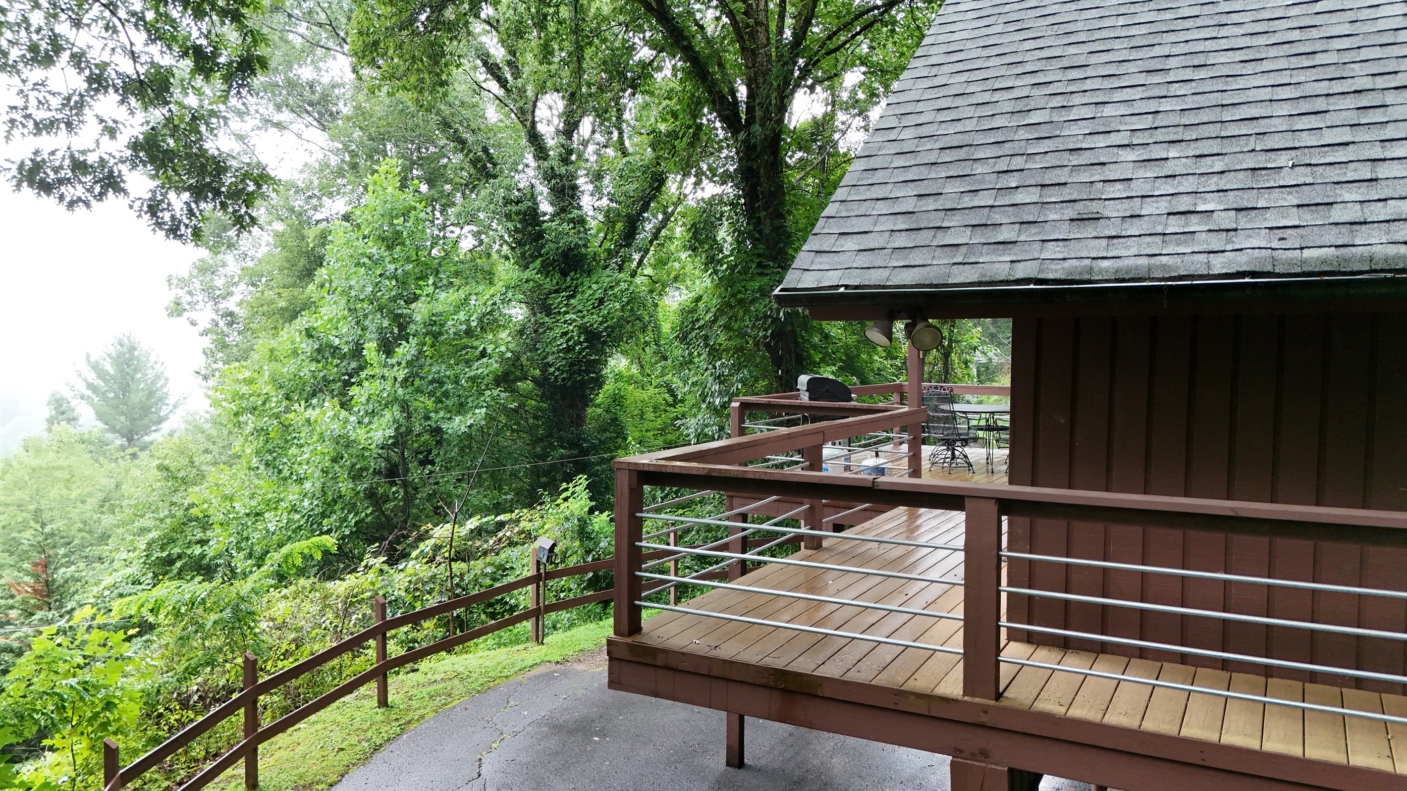 Deckside serenity: Unwind and enjoy the peaceful forest views from your private deck. 