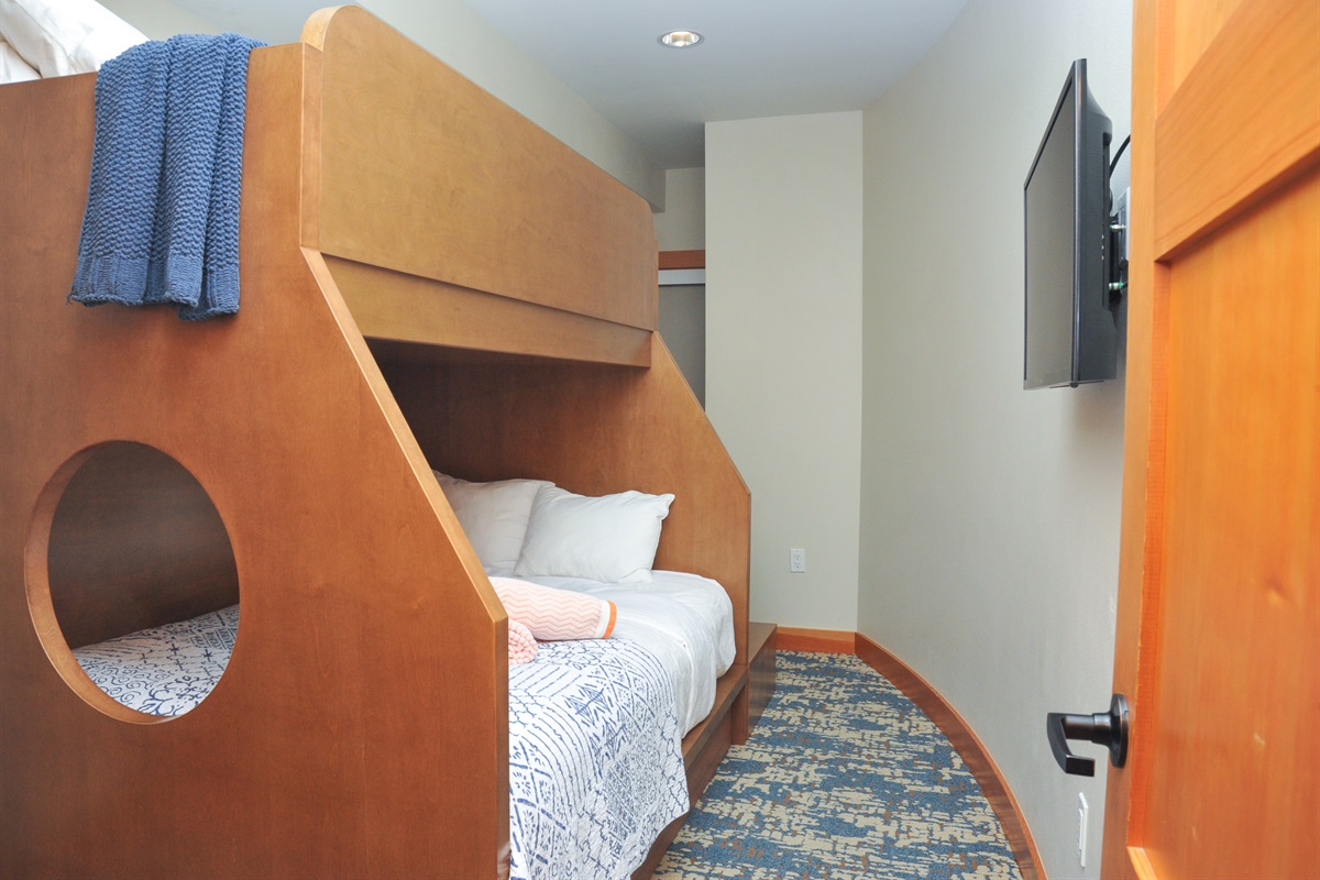Bedroom #3 of 3: TV + Bunk beds: full sized bottom bunk with twin sized top bunk