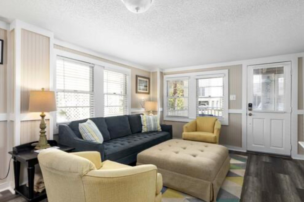 Gather in the bright, open living area where there is room for everyone to stretch out after a day on the sand. ⭐