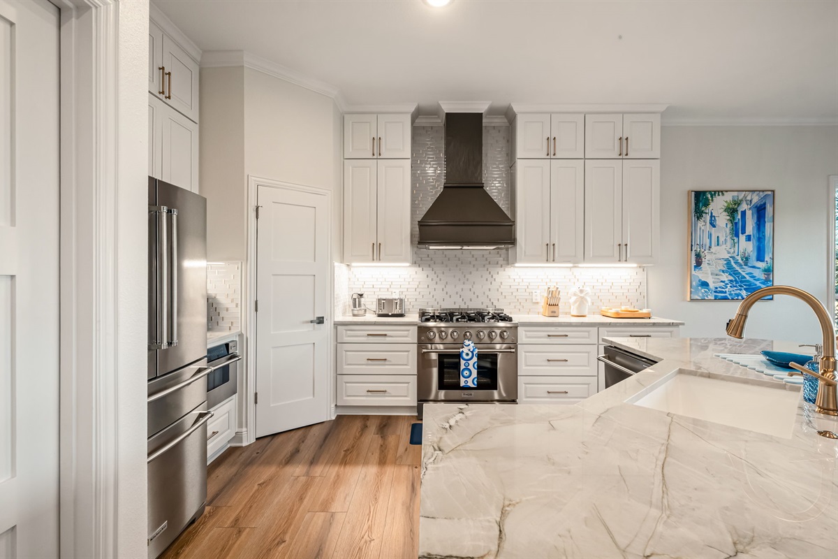 Modern gourmet kitchen featuring premium appliances and stylish finishes.