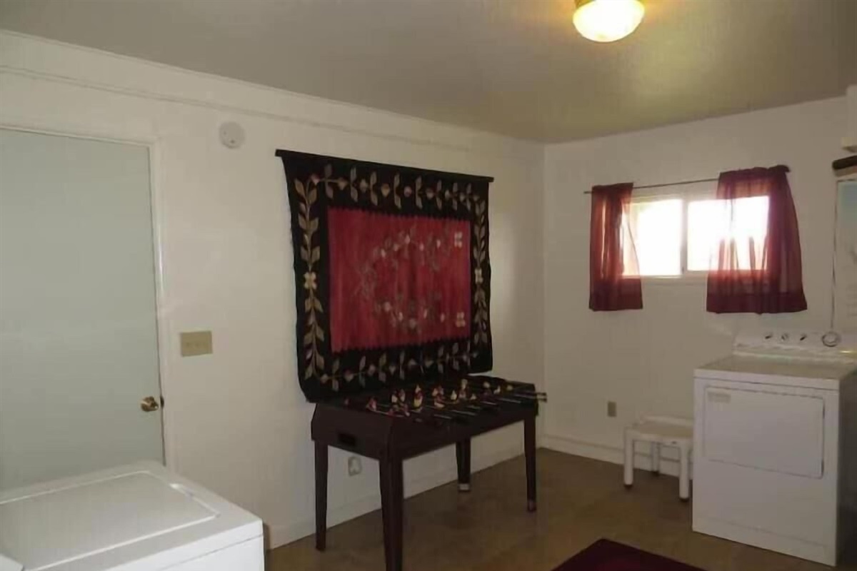 laundry room with foosball