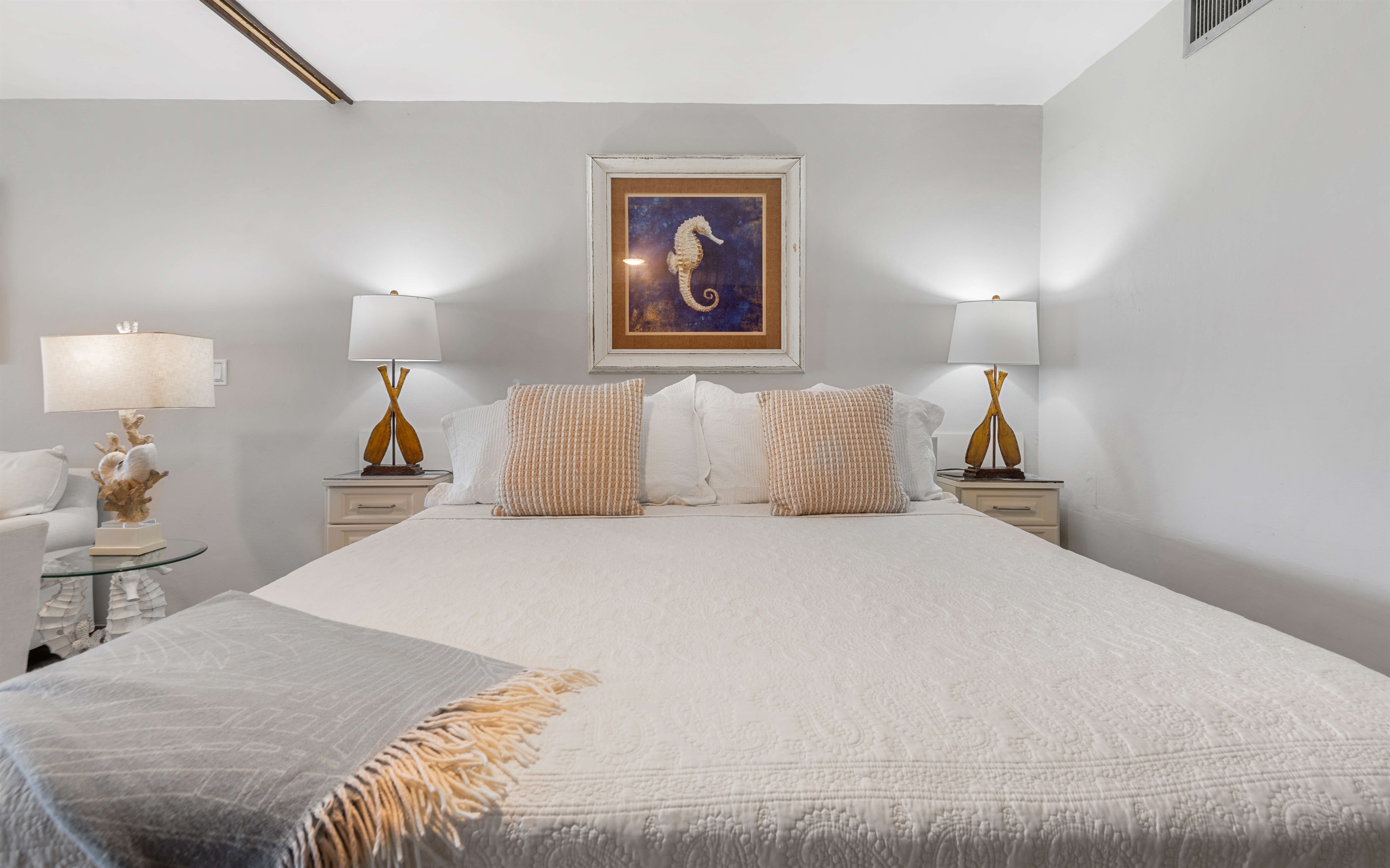 King size bed with chargers, comfy pillows and ceiling fan