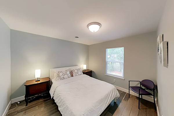 Bedroom Retreat: Bright and airy space with a queen bed, perfect for restful nights after beach fun!