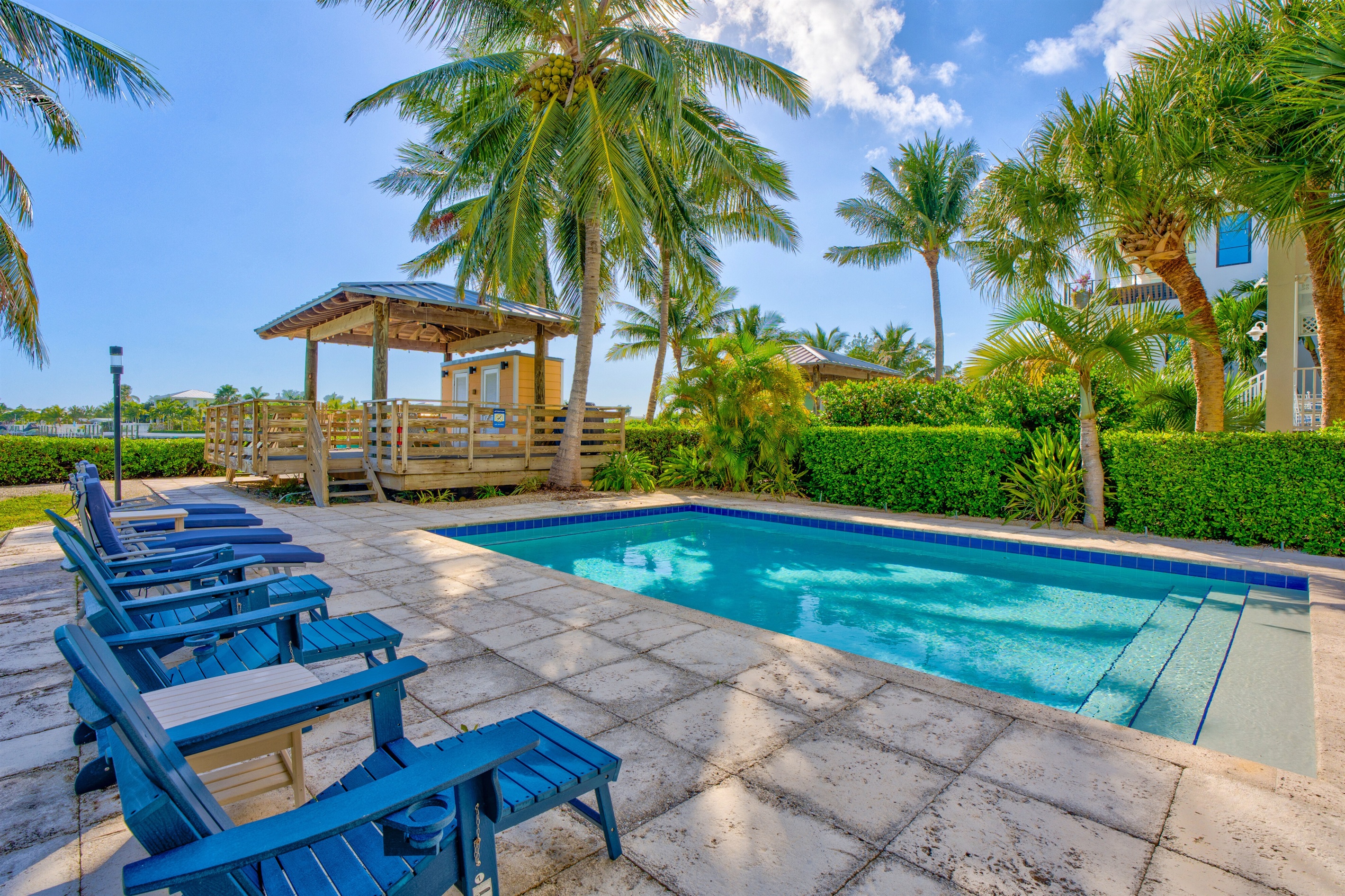 Spend the day bathing in the sun on the padded loungers next to the pool.