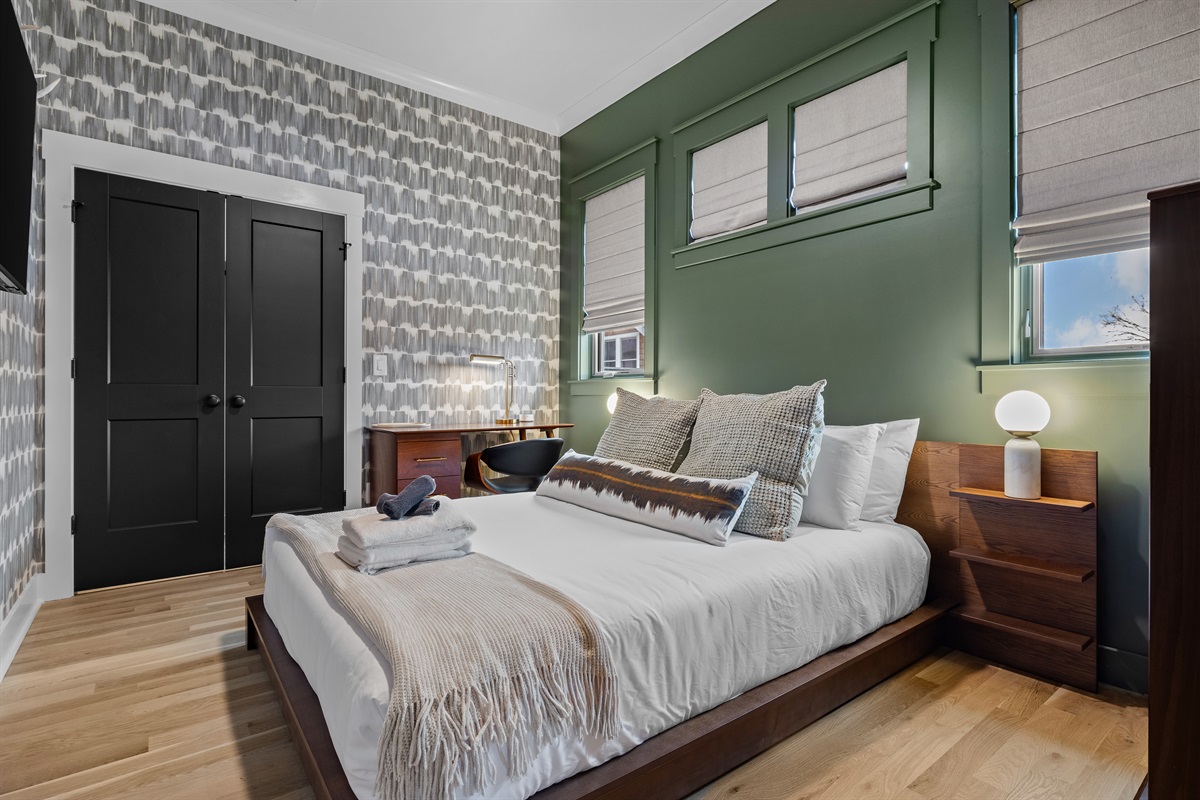 A calm, hotel-level sleeping space designed for deep rest and unrushed mornings.