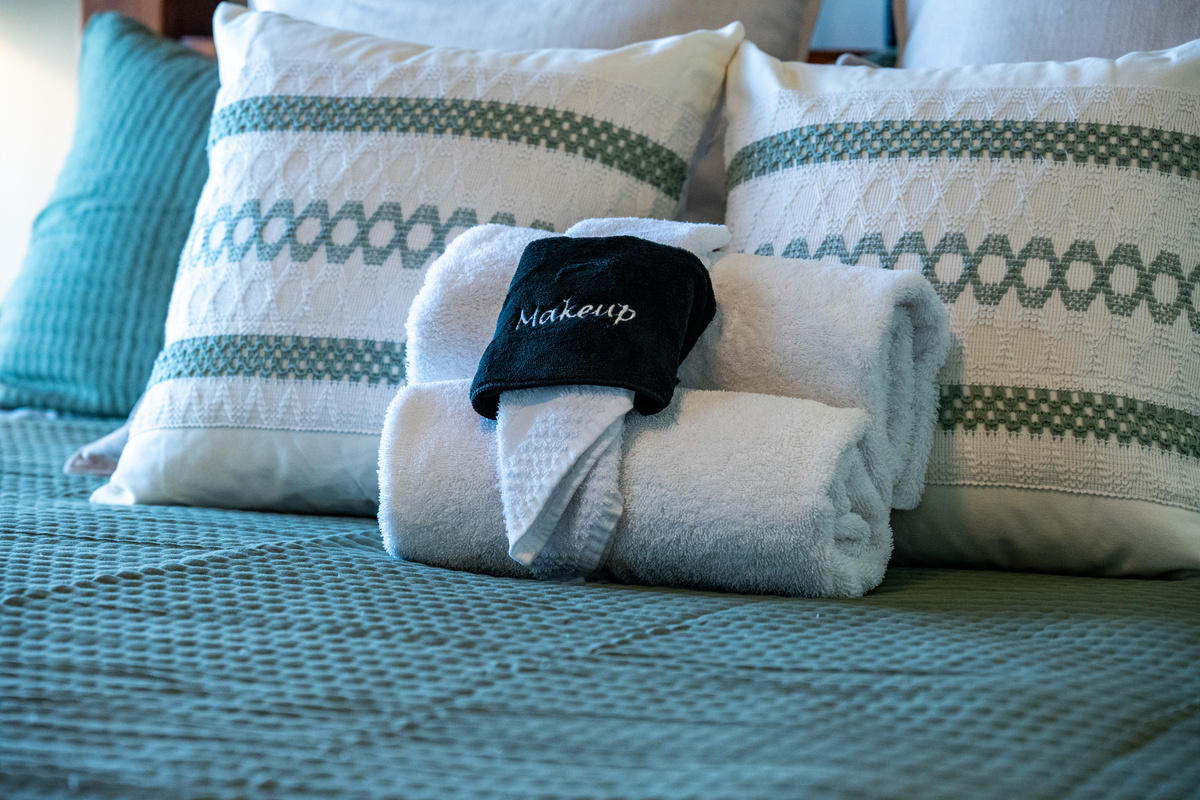 Plush king bed dressed with fresh linens for a restful night's sleep.