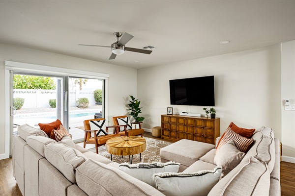 Right out the door to the patio and pool.