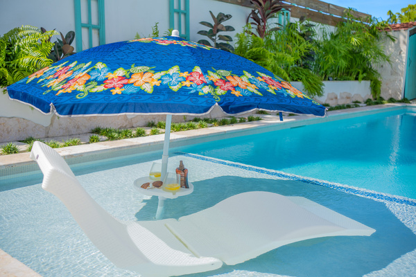 Time for a poolside cocktail in our salt water pool in Dorado, Puerto Rico.