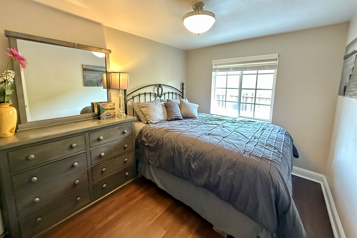 Rest and recharge in this cozy queen bedroom on the upper level, just steps from the river views, the hot tub deck, and everything that makes this retreat so special.