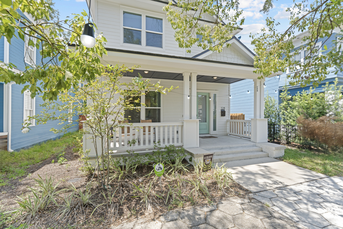 String lights, a place to sit, and a mint green door. This porch is the first thing you will love and the last place you will sit each night, watching the historic neighborhood go by and letting the evening take its time.