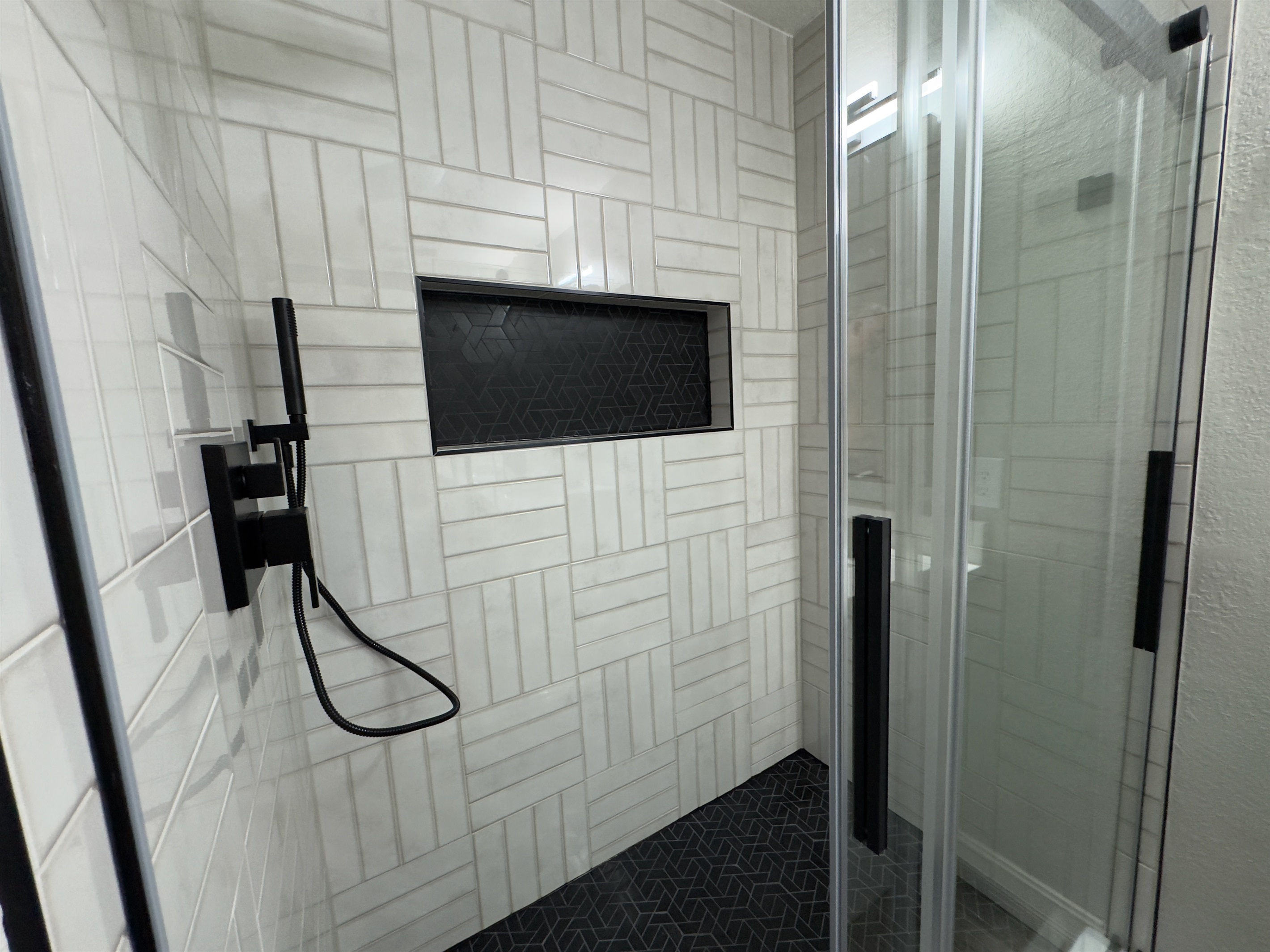 Beauty and the Beast Master Suite Shower with Custom Tile and Rain Shower.