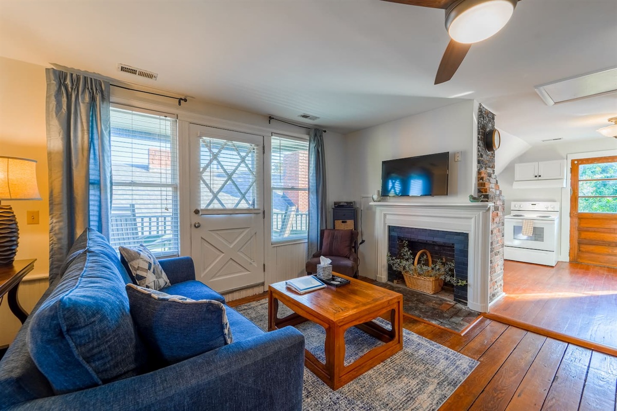 Welcome to the Historic Lovely Loft! Although the beautiful, original fireplace is unable to be used, it adds a warmth to the decor.