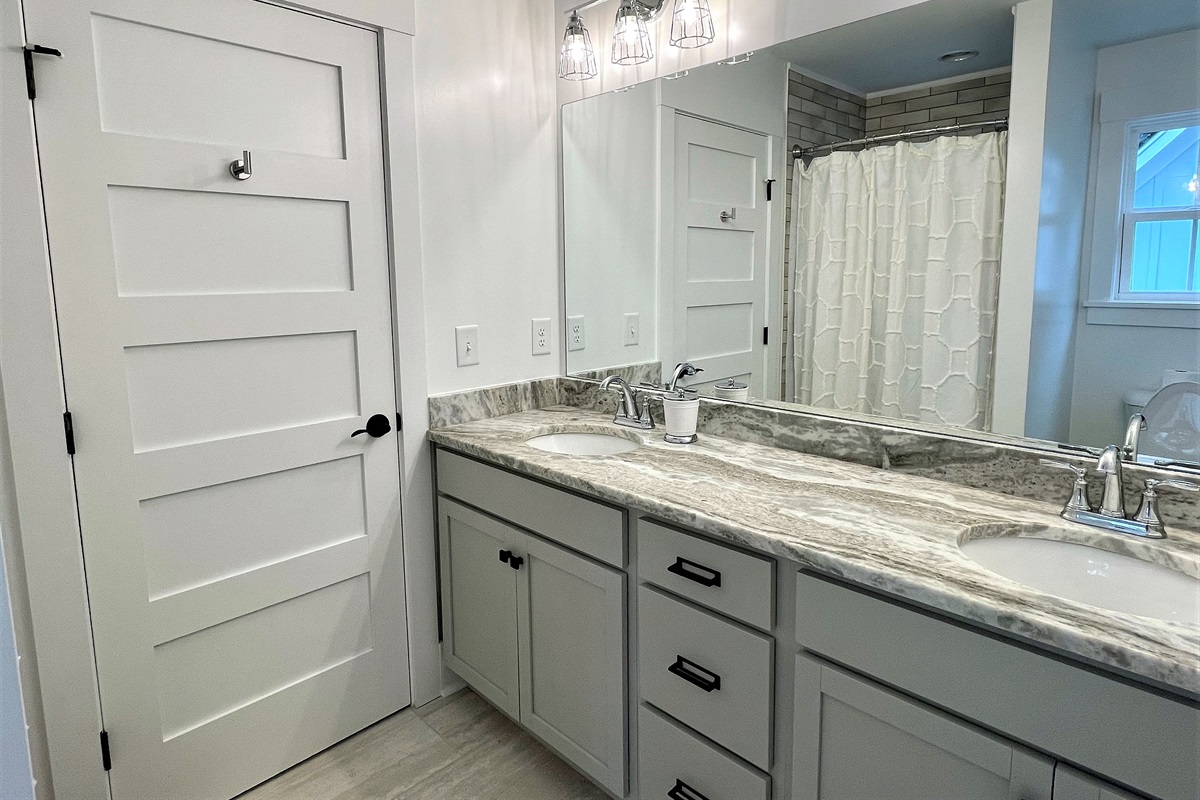 Upstairs bedrooms are connected by a Jack and Jill bath with shower (no tub)