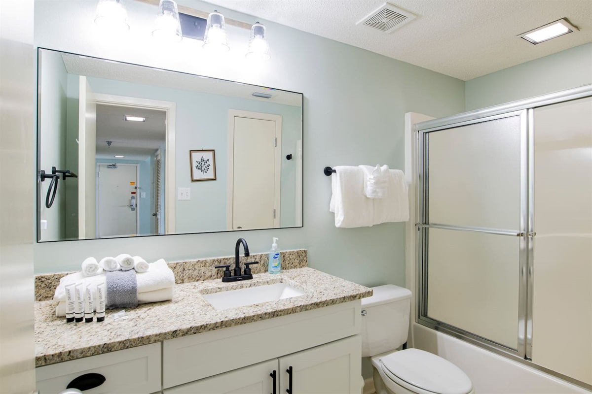 Second bathroom with shower and tub - new vanity and cabinets here!