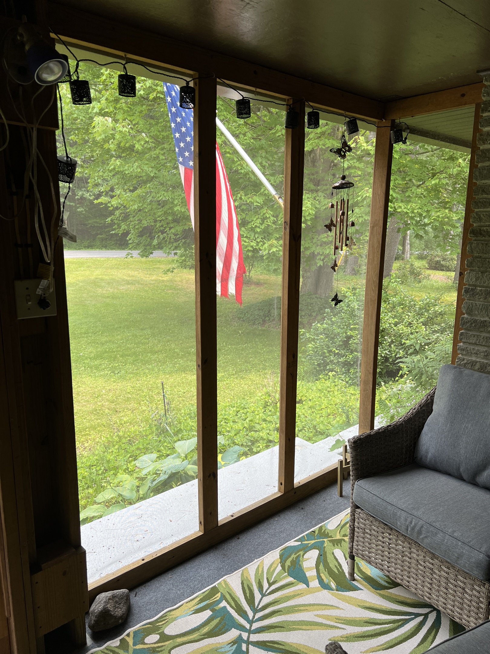 Screened front sitting porch, great for morning coffee!