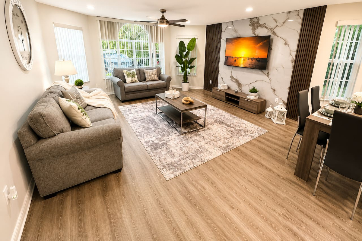 Living room with comfortable seating and an open layout for relaxing together.