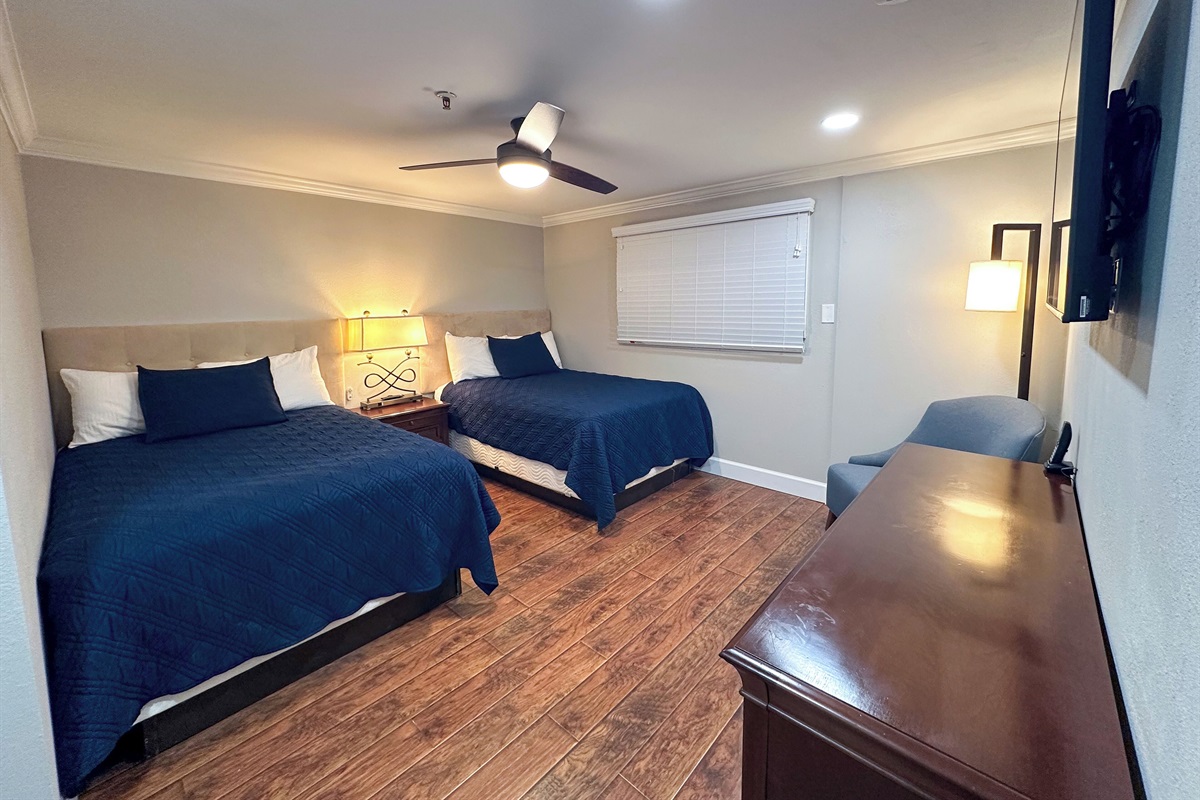 Two double beds with Beautyrest mattresses in the second bedroom.