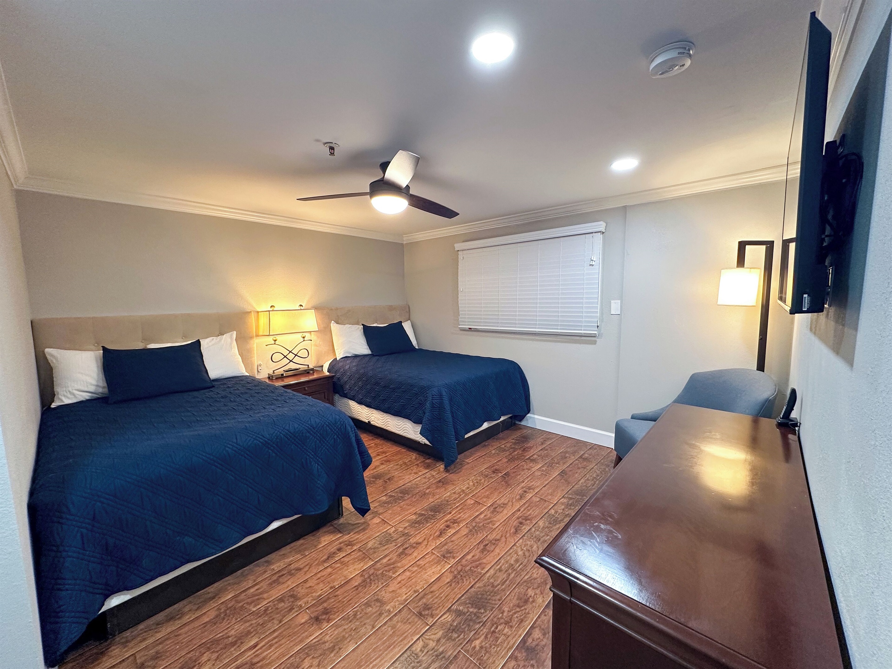 Two double beds with Beautyrest mattresses in the second bedroom.