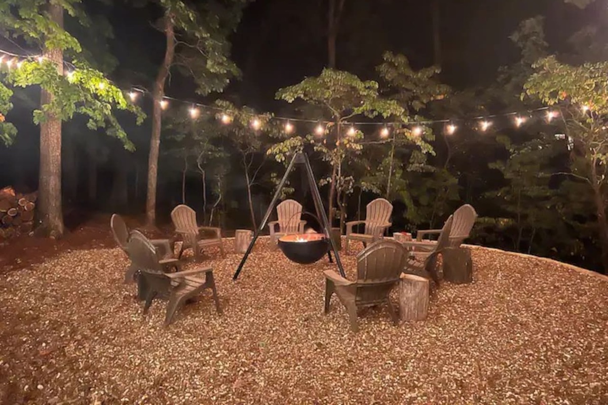Firepit under the stars with cozy string lights