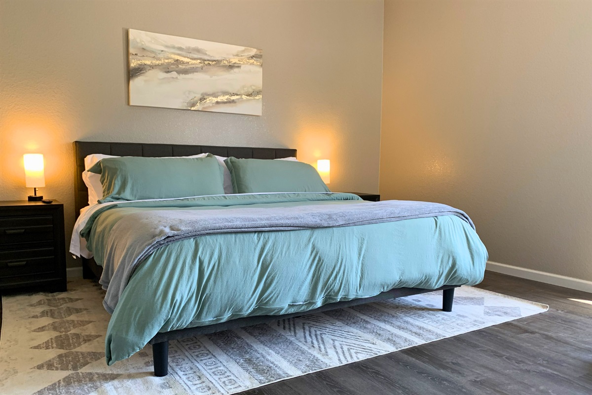 Spacious layout and peaceful design with a king size bed make the Primary bedroom a true retreat. 