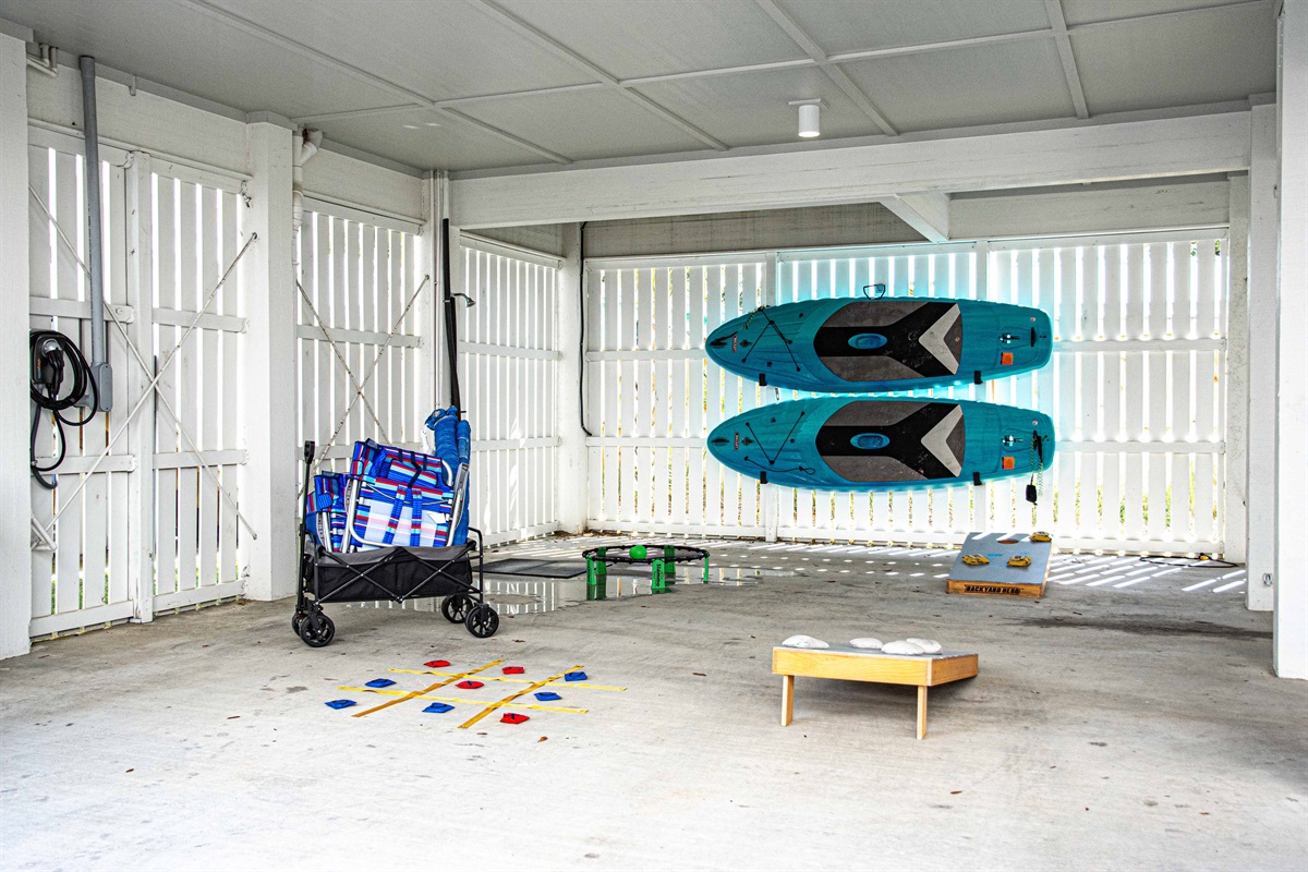 Everything you need! Beach chair, umbrellas, paddleboards, wagon, corn hole, tic tac toe, spike ball! We have you covered. Get a tourny going with everyone!