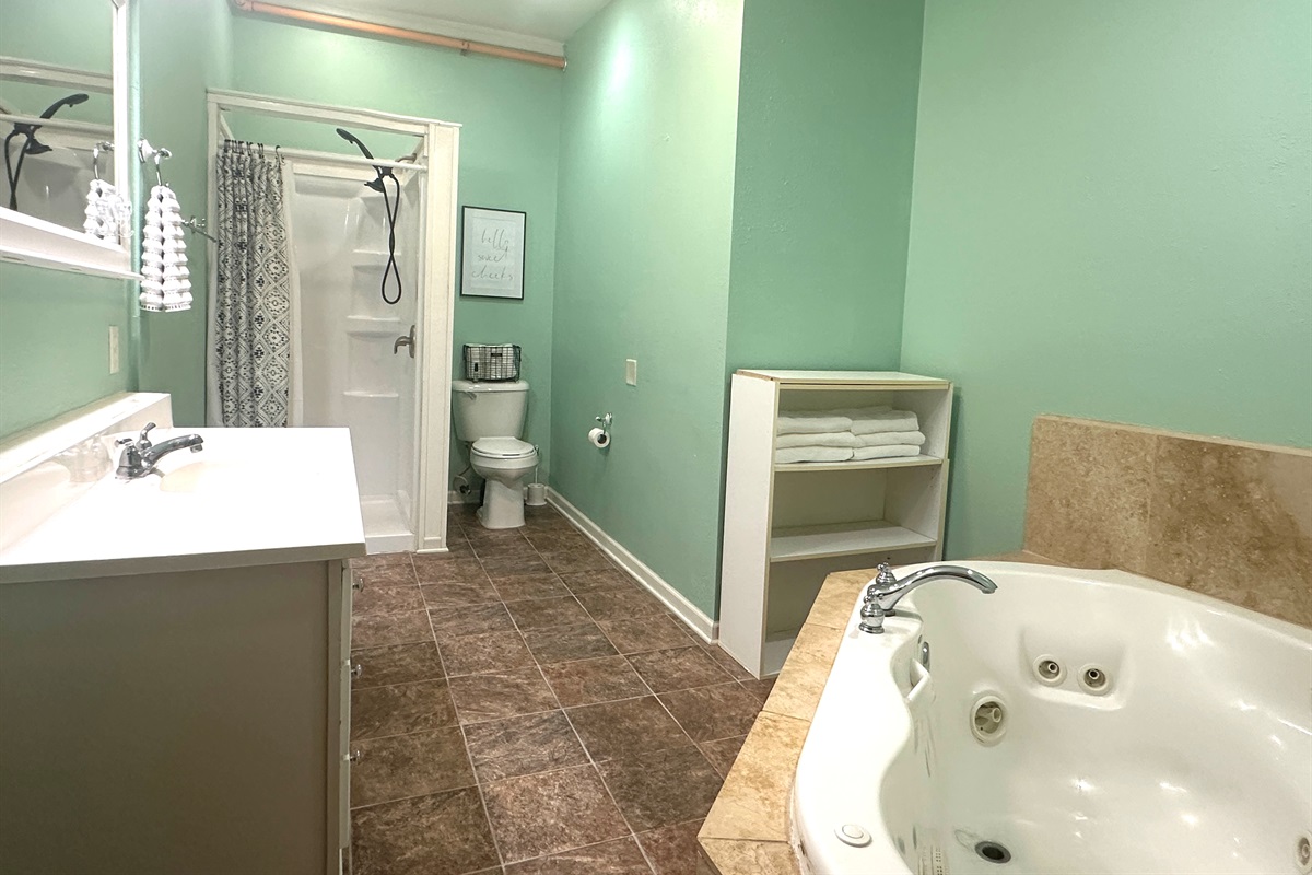 The bathroom offers a jetted tub for two!