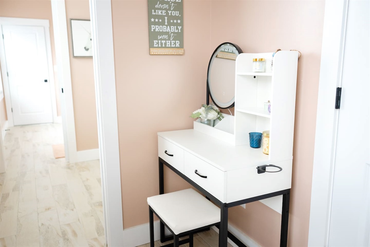 View looking from doorway of bedroom #5 through private sink/vanity area to bedroom #4's private sink/vanity area. Sliding doors for privacy in between with separate toilet and shower rooms.