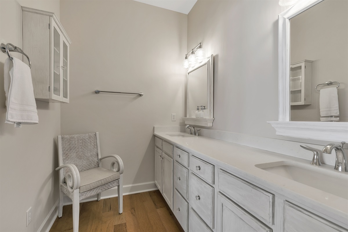 Master bath with double vanities and walk-in shower