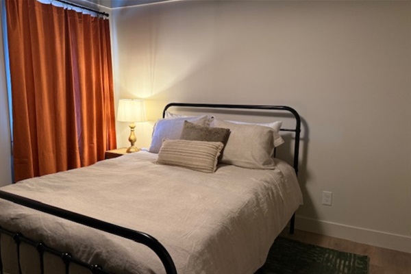 Primary bedroom with cozy queen bed and fresh linens