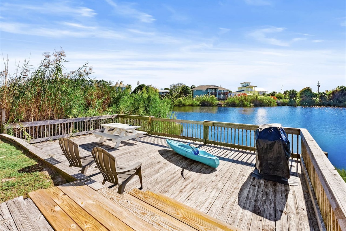 Grill and chill on the lower deck overlooking the water.