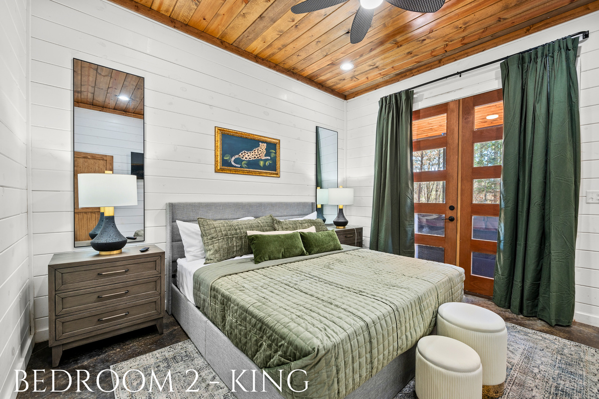 A charming king bedroom with rich textures, warm accents, and a private retreat for restful nights.