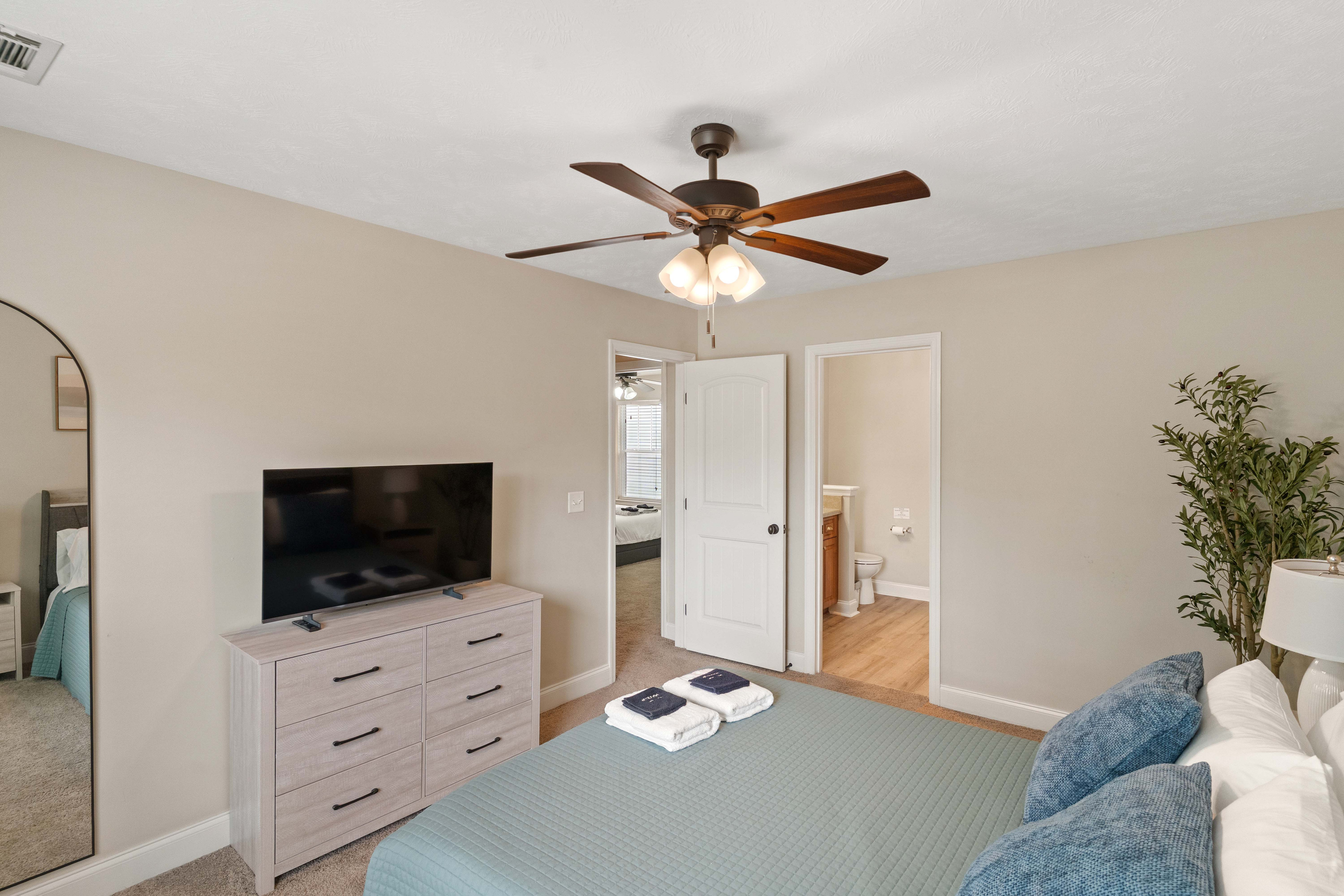 Bedroom 2 with En-suite Bathroom, Walk-in Closet, and Flat Screen Smart TV