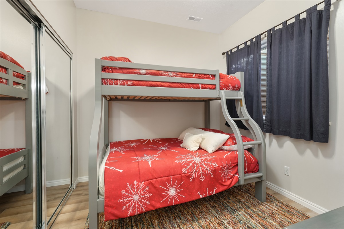 Fun bunk room with a twin-over-full setup—great for kids or extra guests.