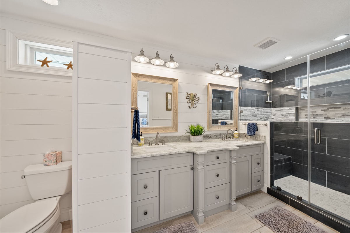 Master ensuite bathroom that has been newly updated with double vanity and huge walk in shower. 