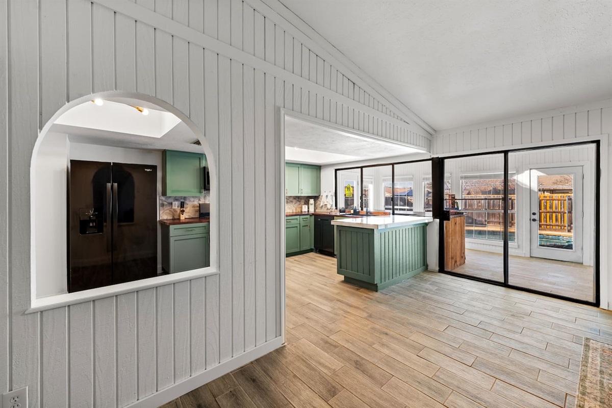 Spacious and seamless design ties together the kitchen, dining, and living areas for effortless flow and easy gathering.