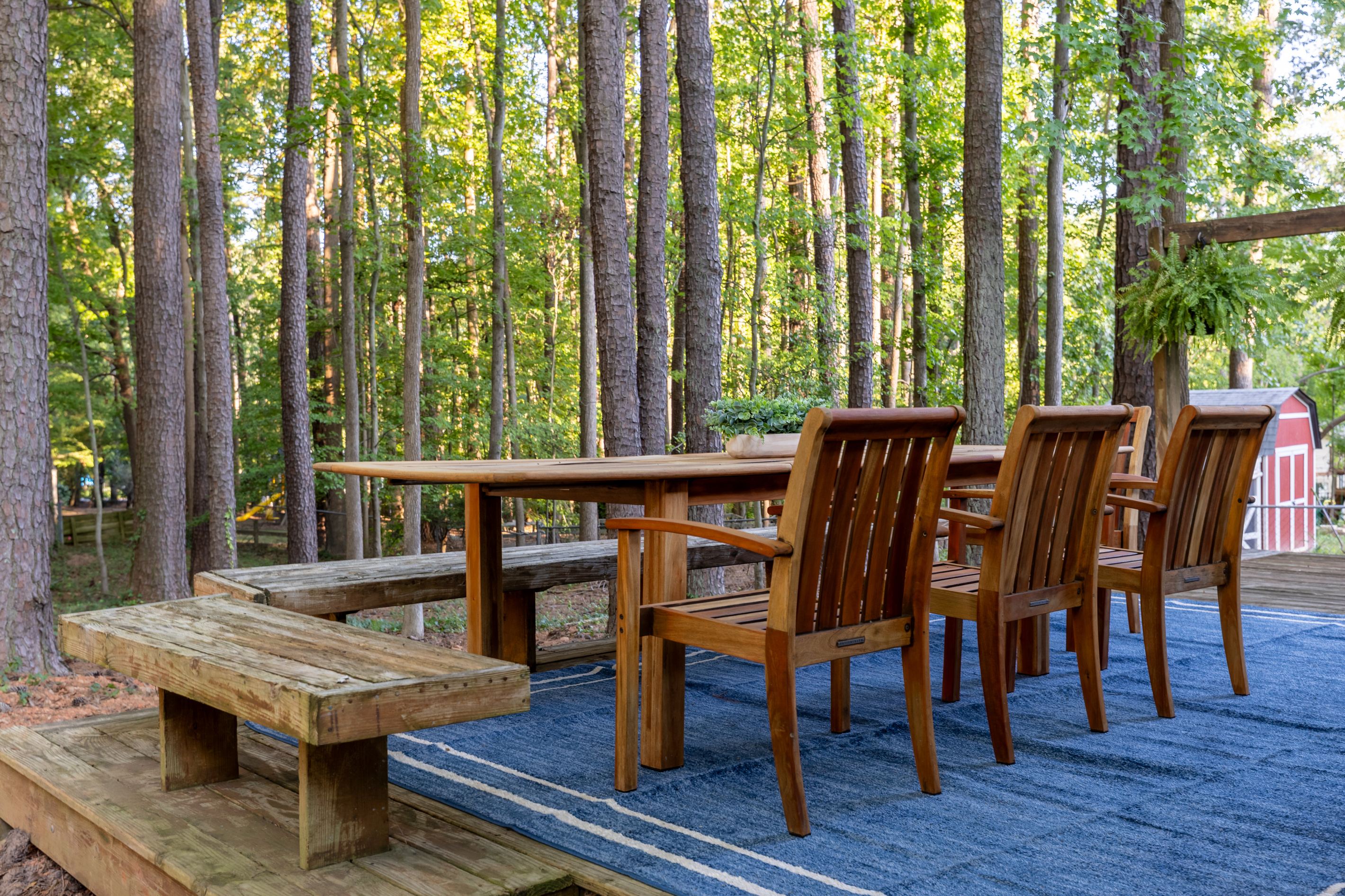 The beautiful teak table easily seats 10 guests.