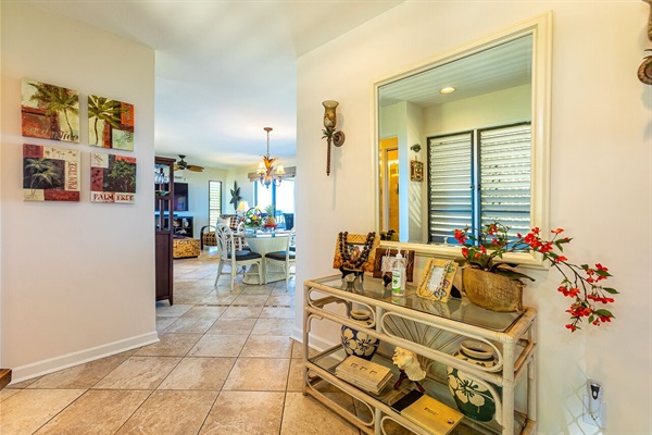 Beautiful tropical entryway with recently upgraded tumbled travertine flooring