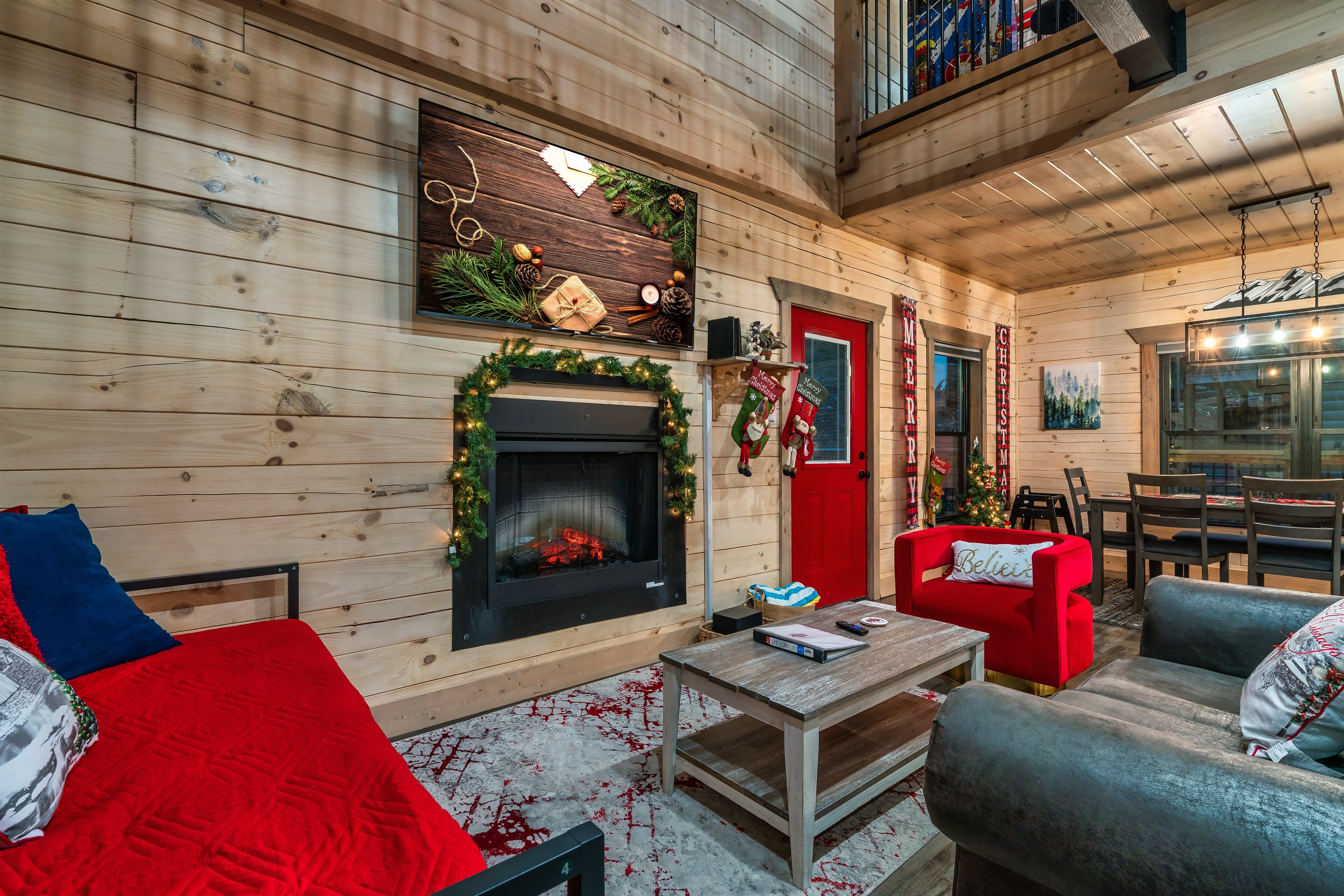 Gather by the fireplace and enjoy festive vibes in this bright, inviting space!