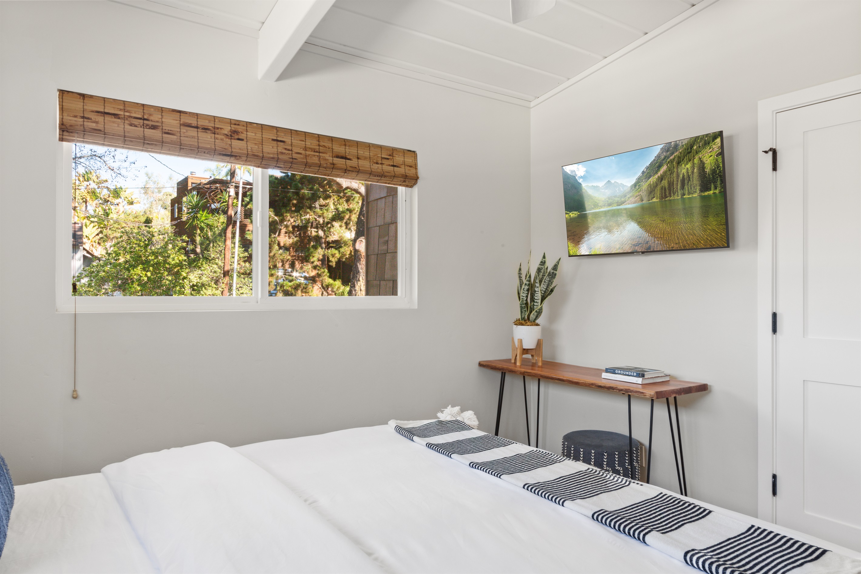 Guest bedroom two with TV