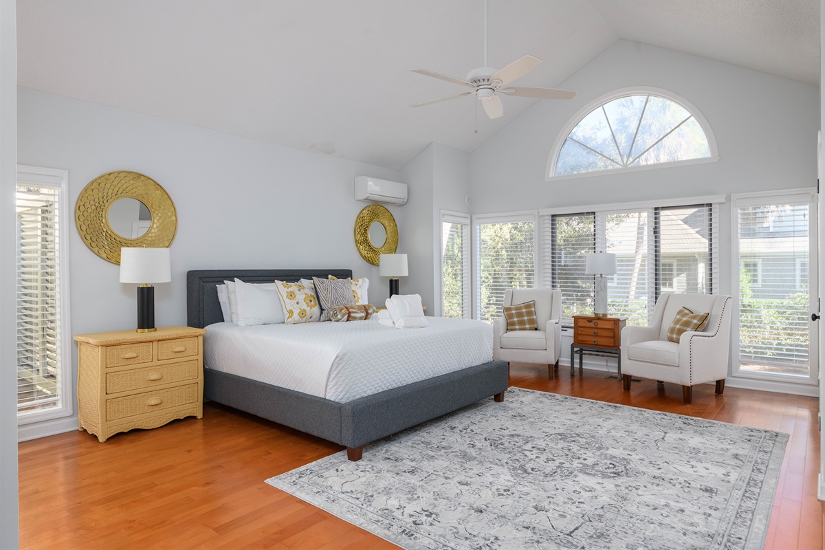 Master bedroom features king bed