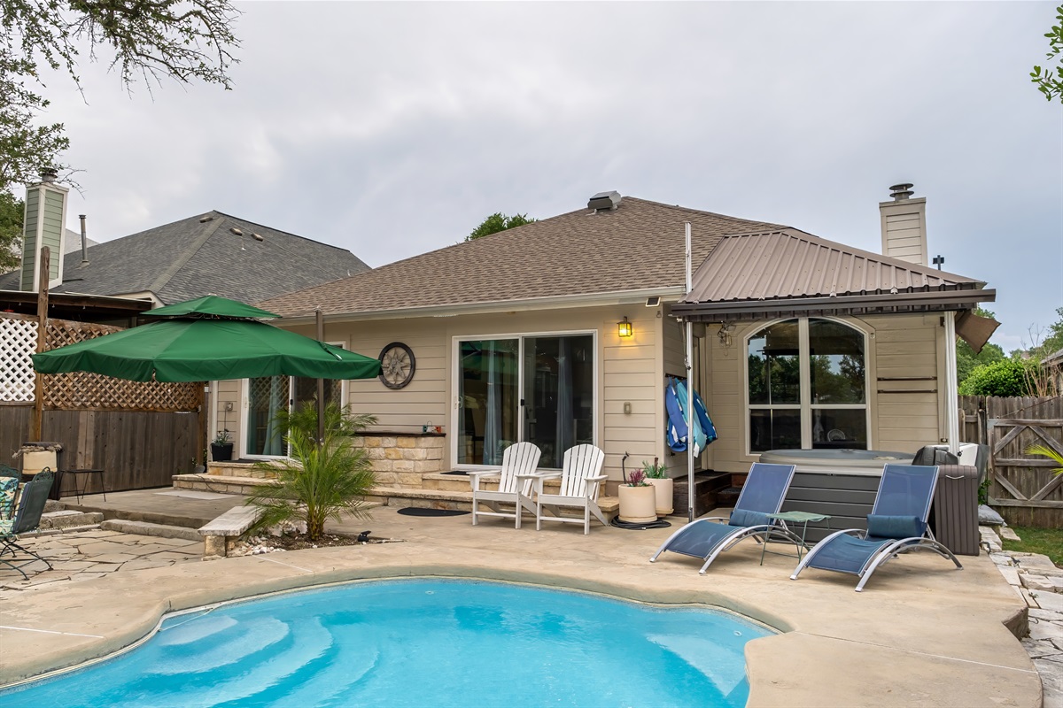 Naturally shaded patio made of Texas limestone that stays cool on hot summer days.