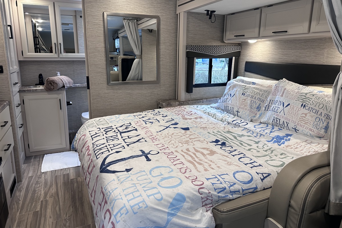 Spacious bed with lots of storage over it