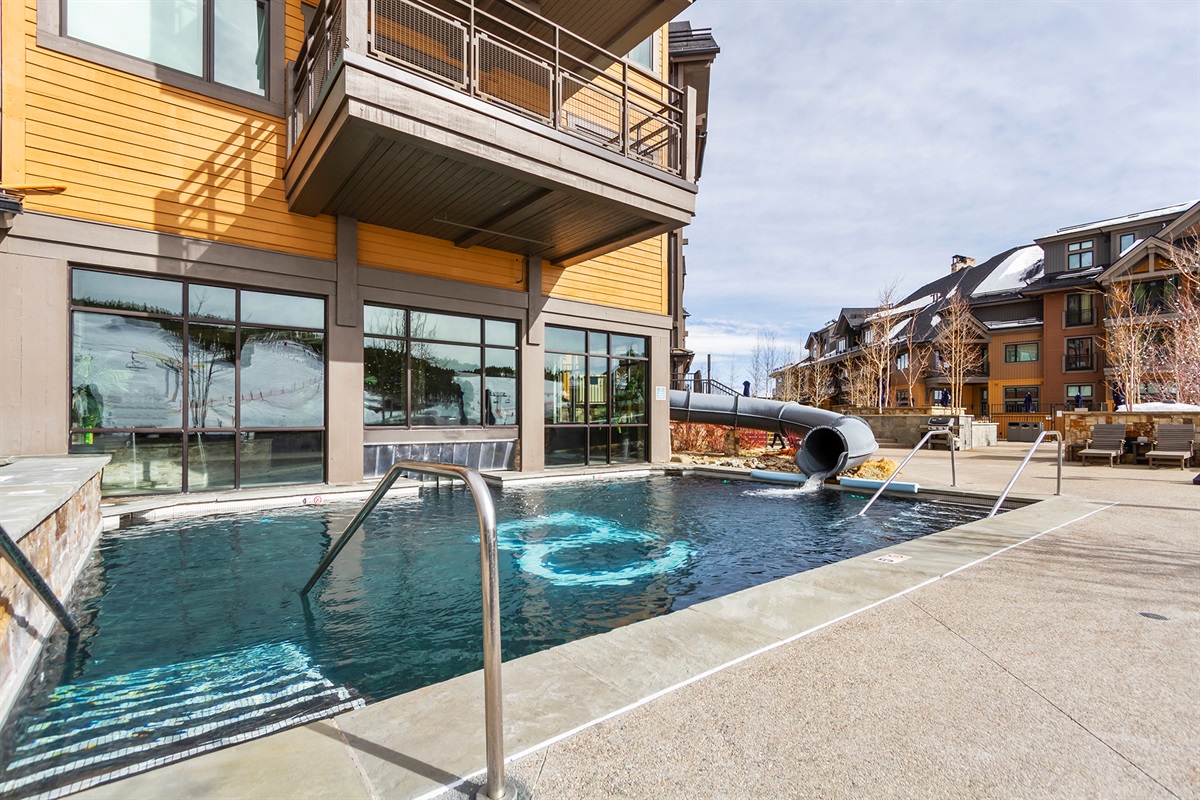 Outdoor pool with slide